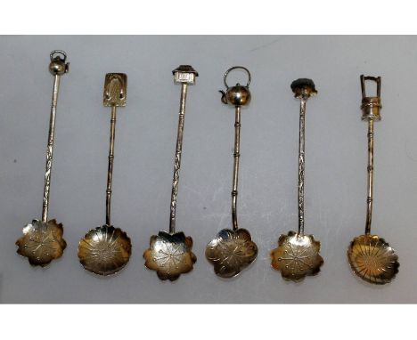Six Chinese silver cocktail spoons.