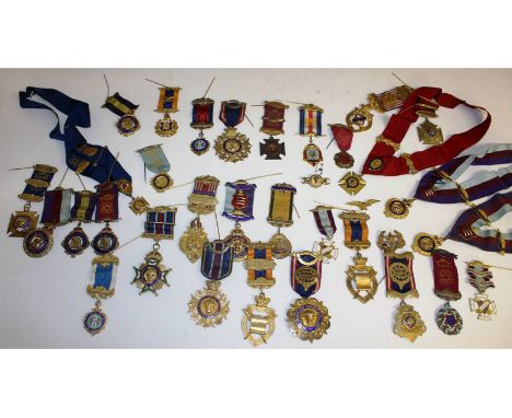 A collection of twenty four silver and enamel Masonic medals, and ten Buffalo medals.