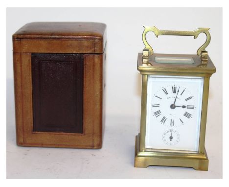 A 19th century French brass carriage clock with alarm, in a leather case. 4.5ins high. 881.