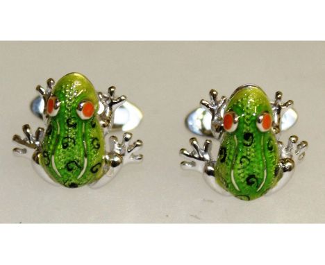 A pair of sterling silver and enamel cufflinks in the form of frogs.