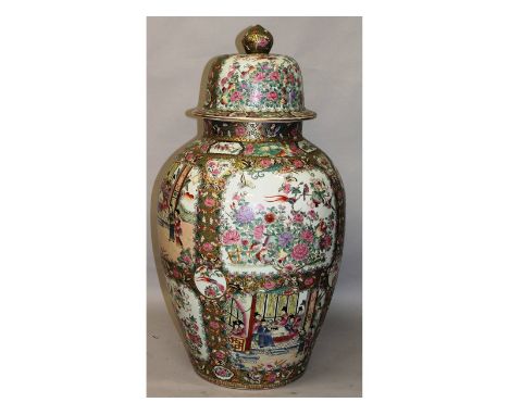 A large Chinese Canton enamel design vase and cover, with an all-over pattern of figures, flowers, birds, insects etc.  3ft h