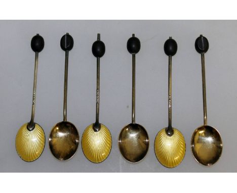 A good set of six enamel silver bean end spoons. Birmingham 1932.