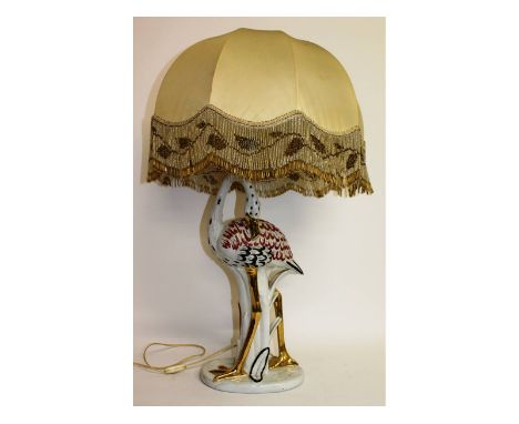 An Italian Capo porcelain bird lamp, with large shade.