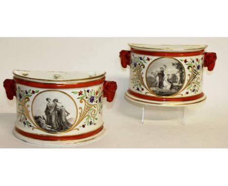 A rare pair of Derby crocus pots, with rams mask mounts and circular sepia panels to the front depicting classical scenes.  9