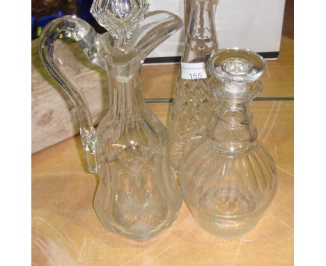 19th century cut glass mallet shaped decanter with polished pontil, claret jug (with restoration ) and one other decanter