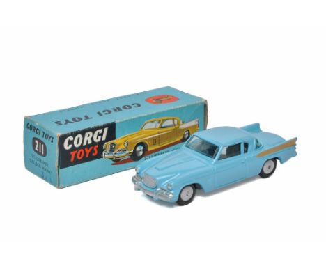 Corgi No. 211 Studebaker Golden Hawk. Light blue with gold flashes. Generally excellent with little sign of age related wear.