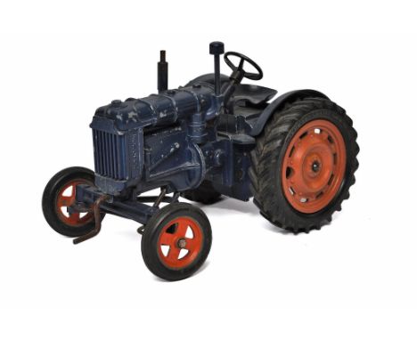 Chad Valley vintage mechanical issue comprising Fordson Major E27N Tractor. Fair to good only with mechanism in need of repai