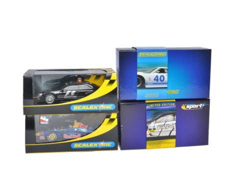 Scalextric slot car issues comprising no.C2943 Ford GT40 1966 White, no.C32392A AMG Mercedes CLK DTM no.2, C2394 Dallara Indy