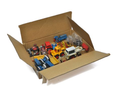 An assortment of mostly playworn farm and construction model diecast including Britains, NZG and others. As shown. 