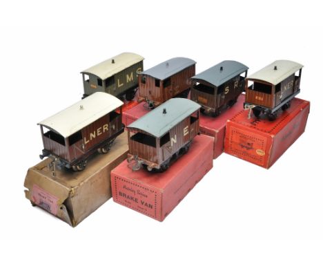 A group of 6 Hornby Model Railway O Gauge No.1 Brake Vans including LNER, SR, LMS. Generally in good condition with boxes, so