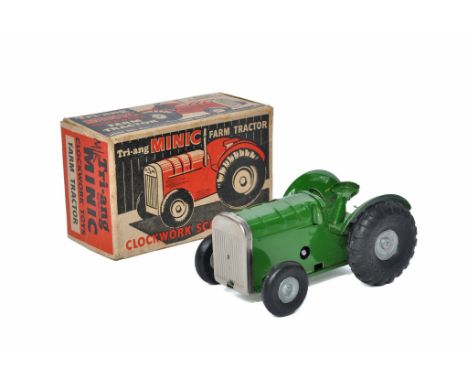 Triang Minic Mechanical (Clockwork) issue comprising farm (wheeled) tractor. Generally excellent with only the odd age relate