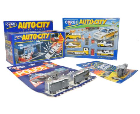 A group of 1980's Corgi Diecast issues comprising smaller scale police vehicles and sets as shown. Look to be excellent in ge