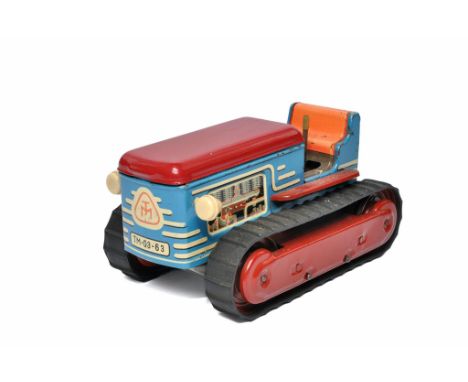 Tatrasmalt Pasak (Czech) 1960's battery operated tinplate tracked crawler tractor. Untested but appears generally good. 