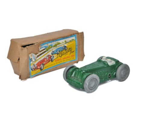 Castle Art Products (Gaiety Toys, England) mechanical clockwork racing car in red. Generally very good to excellent with only