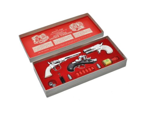BCM (England) Outlaw Antique 'toy' gun firearm presentation set. Looks to be complete with little sign of use in original box