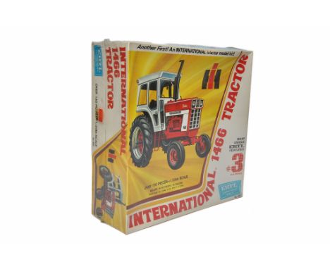 Ertl 1/25 plastic model kit comprising International 1466 Tractor. Sealed with wrapper. 