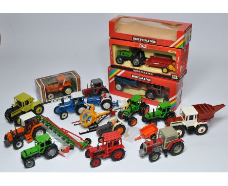 An impressive collection of Britains Farm (Childhood collection) comprising several tractor and implement issues as shown. So
