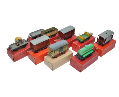 Hornby Model Railway O Gauge Collection (9) comprising Cattle Truck Red Based NE, No.50 Goods Van BR (minor scratch on one si