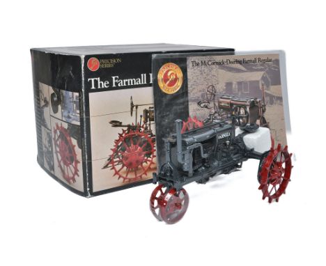 Ertl Precision 1/16 farm model issue comprising Farmall Regular Tractor. Model appears excellent with no obvious sign of faul