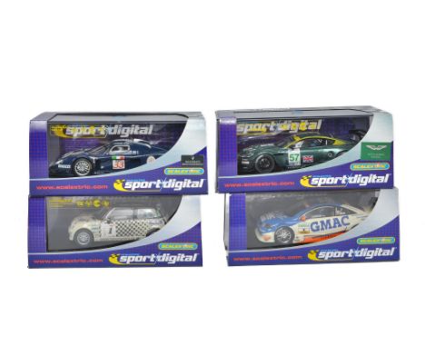 Scalextric Sport Digital slot car issues comprising C2630D Maserati MC 12 no.33, C2564D Mini Cooper S no.1, C2644D Aston Mart