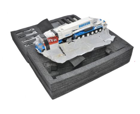 YCC 1/50 diecast model construction issue comprising Gottwald AMK 1000 Mobile Crane in the livery of Breuer. Superb model has