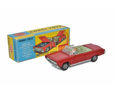 Corgi No. 246 Chrysler Imperial. Maroon with olive green interior, two figures plus golf clubs and trolley. Generally good, s