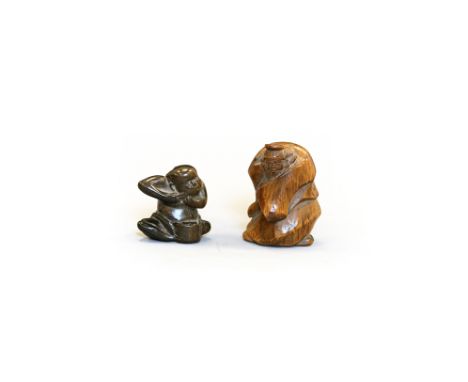 Two wood NetsukeJapan, Edo period (1603-1868) 19th centuryOne carved standing wearing a long cloak, the other of a bather gro