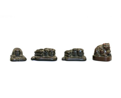 Four wood netsukeJapan, Edo period (1603-1868) early 19th centuryConsisting of three netsuke of Karako resting on an uchiwa, 