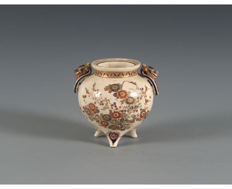 A Satsuma tripod koroJapan, 19th centuryOf rounded form standing on three lightly splayed pointy feet, set with two dragon he