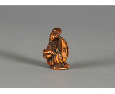 A wood netsuke of a pair of Noh dancers performing the Sambaso Japan, Edo period (1603-1868) 18th/19th centuryFinely carved s