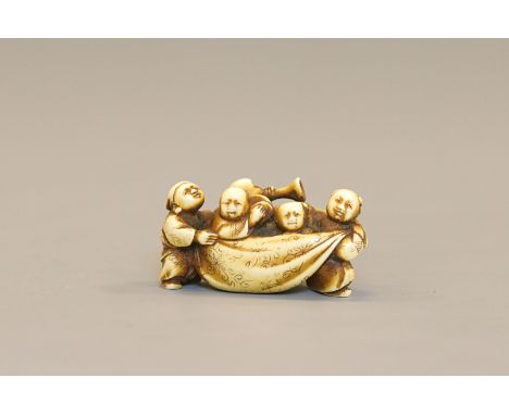 An ivory Netsuke of Jurojin with sack and KarakoJapan, 19th centuryFinely carved in the shape of Hotei with his sack, a Karak