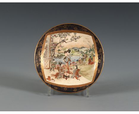 A Satsuma dishJapan, Meiji period (1868-1912), late 19th/early 20th centuryOf rounded form standing on a short footring, deco