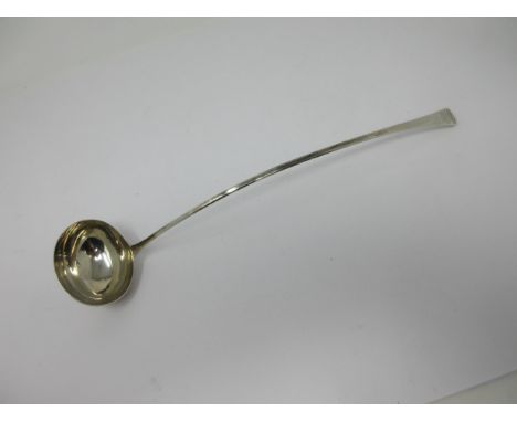 A Georgian silver Ladle with long narrow handle having shell finial, 13in L 