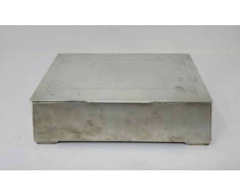 A George VI silver Art Deco Cigarette Box with engine turning, London 1938, 7in x 4in 