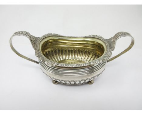 A George III silver two-handled Sucrier with gadroon and shell border, semi-fluted on ball feet, London 1816, 340 gms 