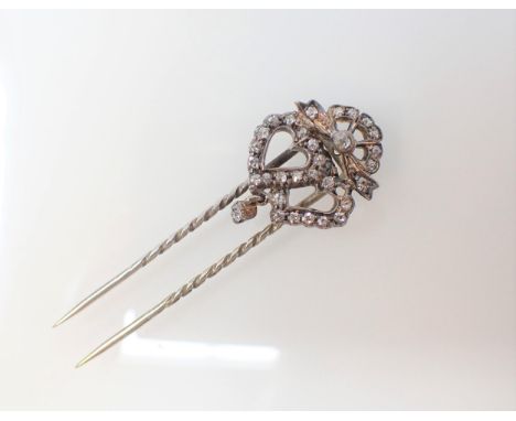 A 19th century double heart Diamond Stick Pin pavé-set old cut stones throughout, stones deficient. 