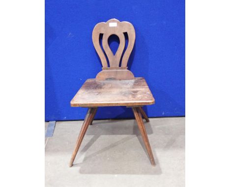 A 19th Century primitive Welsh fruitwood Chair with pierced back on stick legs 