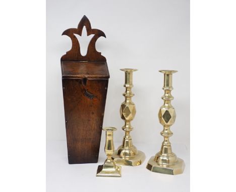 A 19th Century Welsh oak Candle Box with pierced trefoil shaped back 19in H, a pair of 19th Century diamond stemmed Candlesti