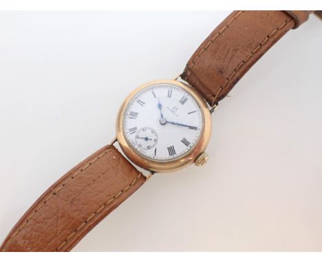 A gentleman's 1930's Omega manual Wristwatch the white enamel dial with roman numerals, blued hands and subsidiary seconds di