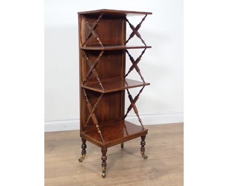 A small mahogany four tier Whatnot with turned and square cross frame bracket supports to shelves on turned feet with brass c