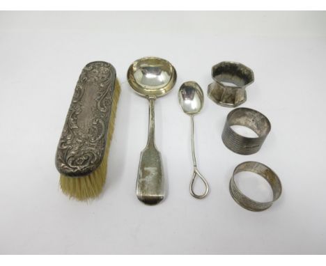 A Victorian silver Sauce Ladle fiddle pattern, engraved crest, Exeter 1854, another Ladle, Sheffield 1908, three silver Napki