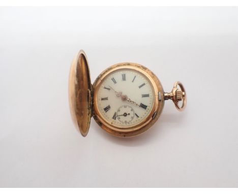 A Continental 14ct gold cased Fob Watch the white enamel dial with roman numerals and subsidiary seconds dial, outer case wit