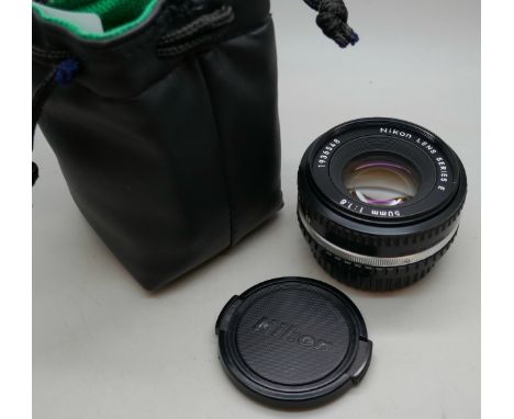 A Nikon camera lens series E. 50mm 1:18 (standard lens) 