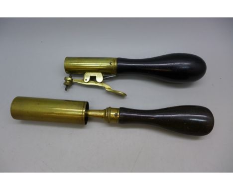 A gun barrel cleaning brush and one other gun tool, both marked Hawksley