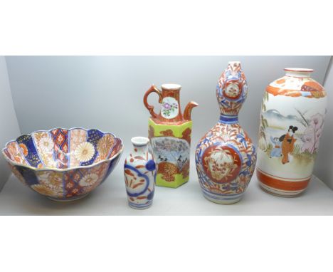 Five oriental porcelain items including an Imari bowl and vase, vase with geisha design, jug and another small vase  **NOT EL