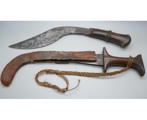 A Kukri and a Persian knife, scabbard split and handle a/f, *This lot is not available for packing and posting*
