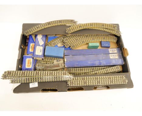 A collection of Hornby Dublo railway tracks 00 gauge with other boxed items, switch points, etc.