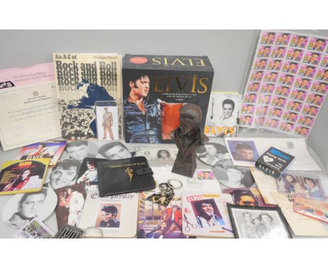 Elvis Presley, various collectables including books, a pack of photograph playing cards, a boxed mug and more.