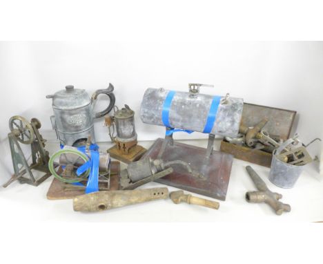 A collection of steam engine and pump parts 