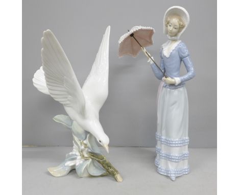 Two Lladro figures comprising of a lady with parasol (a/f) and a turtle dove on branch 